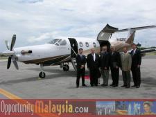 Executive Airport Fort Lauderdale, July 20th 2004.From left to right: Digital Media Network sponsored the event and transported the team to The Florida Space Authority. From Left to Right; Thomas Bernthaler Co-pilot and CTO of Digital Media Network, Bernhard Schutte CEO of Digital Media Network, Jim Tarlton President of the Broward Alliance, Chris Pollock, President of The Greater Fort Lauderdale Chamber of Commerce, Michael Corbit Executive Director of the Internet Coast, and John McCartney Director of the US Dep. of Commerce for Florida.