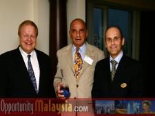 Group Photo of Bernhard Schutte, John Bauer and Jacques Roy.From Left to right: Bernhard Schutte, CEO of Digital Media Network (DMNI) Consul John Bauer, President of Basic Food International and Jacques Roy, General Manager of The Atlantic Hotel in Fort Lauderdale.