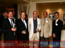Group Photo of Chris Cronje, Bernhard Schutte, Kevin Gale, John Bauer and Thomas Bernthaler.  From Left to right: Chris Cronje, President & CEO of Alpine Engineered Products, Bernhard Schutte, CEO of Digital Media Network (DMNI), Kevin Gale, Editor of South Florida Business Journal, Consul John Bauer, President of Basic Food International and Thomas Bernthaler, CIO of Digital Media Network(DMNI)