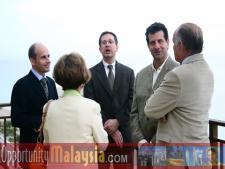The Atlantic Hotel Management Jacques Roy, Dan Clark and Nick Mautone talking to Consul John Bauer and his wife Mimi Bauer.From Left to right: Jacques Roy, General Manager of The Atlantic Hotel, Mimi Bauer, Dan Clark, food and beverage manager of the Atlantic Hotel, Nick Mautone, Operating Partner of Trina Restaurant in the Atlantic Hotel and Consul John Bauer, President of Basic Food International.