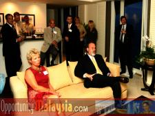 Bernhard Schutte, CEO of Digital Media Network (DMNI), giving an audio visual live Internet presentation about Opportunities in Malaysia. This is some of the business leaders that attended.  Front row from left to right: June Wolfe, President or South Florida Manufacturers Association and Jim Tarlton, President & CEO of the Broward Alliance. Back row from left to right: Gary Press, (Publisher) South Florida Business Journal, Consul John Bauer, President of Basic Food International, Thomas Bernthaler, CIO of Digital Media Network(DMNI) and Chris Cronje, President & CEO of Alpine Engineered Products.